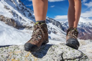 brown-tramping-boots-mountains